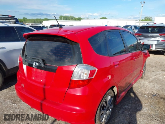 2013 Honda Fit Sport z VIN JHMGE8H51DC080183, wystawiony jako IAAI lot #42178982 z przebiegiem 174 133 mil mil oraz . Historia ofert i sprzedaży dostępna na DreamBid. Obrazek 4.