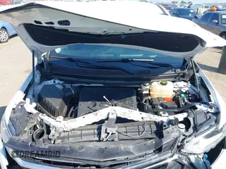 2018 Chevrolet Traverse Premier z VIN 1GNERKKW6JJ220965, wystawiony jako IAAI lot #37625637 z przebiegiem 99 072 mil mil oraz . Historia ofert i sprzedaży dostępna na DreamBid. Obrazek 10.
