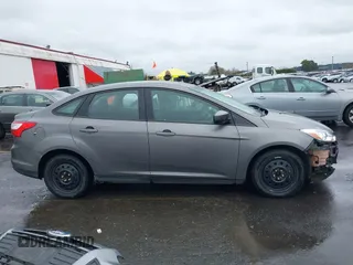 2012 Ford Focus SE with VIN 1FAHP3F24CL217777, listed as a IAAI auction lot 41831391 with 218,308 mi miles. Bid and sale history available at carsss.com. Image 14.