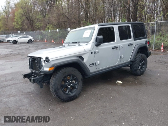 2022 Jeep Wrangler Unlimited Willys Sport with VIN 1C4HJXDM9NW272685, listed as a IAAI auction lot 41948921 with Not provided miles and . Bid and sale history available at DreamBid. Image 2.