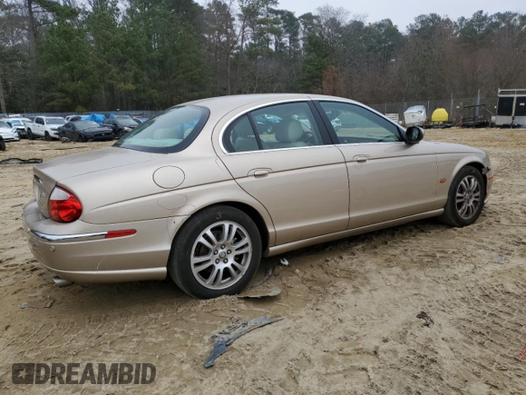2003 Jaguar S-Type z VIN SAJEA01U33HM71782, wystawiony jako Copart lot #82969304 z przebiegiem 127 176 mil mil oraz Szkody całkowita. Historia ofert i sprzedaży dostępna na DreamBid. Obrazek 3.