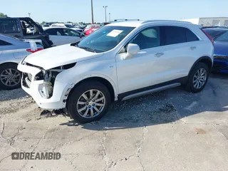 2019 Cadillac XT4 FWD Premium Luxury z VIN 1GYFZCR49KF142039, wystawiony jako IAAI lot #42259448 z przebiegiem 47 620 mil mil oraz . Historia ofert i sprzedaży dostępna na DreamBid. Obrazek 2.
