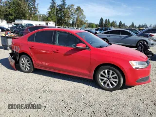 2012 Volkswagen Jetta SE with VIN 3VWDP7AJXCM411045, listed as a Copart auction lot 55111105 with 99,219 mi miles and Salvage title. Bid and sale history available at DreamBid. Image 4.