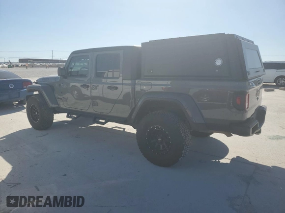 2022 Jeep Gladiator Texas Trail with VIN 1C6HJTAG8NL103449, listed as a Copart auction lot 49823595 with 60,902 mi miles and Salvage Title. Bid and sale history available at carsss.com. Image 2.