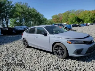 2023 Honda Civic Sport z VIN 19XFL2H85PE004313, wystawiony jako Copart lot #54268555 z przebiegiem Nie podano mil oraz Szkoda całkowita • Salvage title. Historia ofert i sprzedaży dostępna na DreamBid. Obrazek 13.