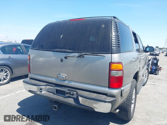 2002 GMC Yukon SLT with VIN 1GKEC13T62R202059, listed as a IAAI auction lot 42023547 with 1 mi miles. Bid and sale history available at carsss.com. Image 4.