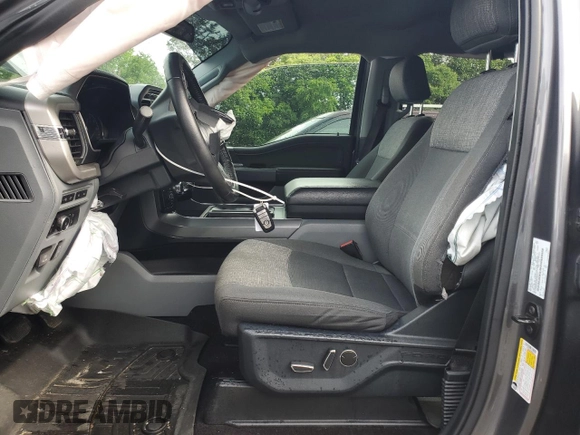 2021 Ford F-150 XL with VIN 1FTEW1EP0MFB98114, listed as a Copart auction lot 55892705 with 47,619 mi miles and Salvage title. Bid and sale history available at DreamBid. Image 7.