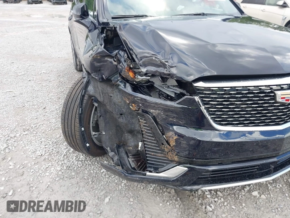 2022 Cadillac XT6 Premium Luxury with VIN 1GYKPCRS4NZ145145, listed as a IAAI auction lot 42533642 with 36,450 mi miles and . Bid and sale history available at DreamBid. Image 6.