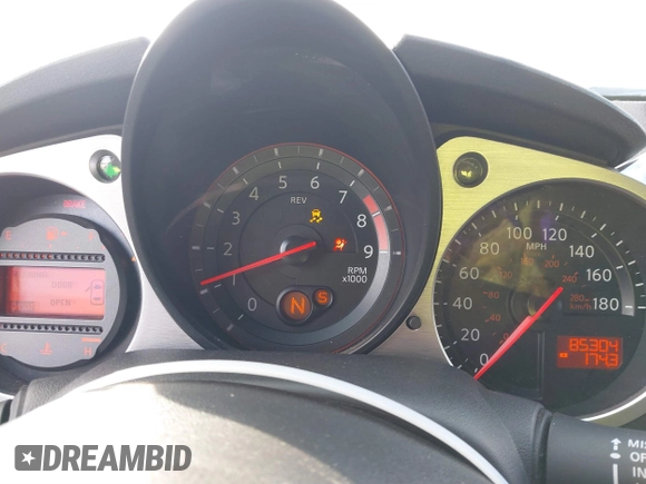 2014 Nissan 370Z Touring with VIN JN1AZ4EH1EM631097, listed as a IAAI auction lot 41230197 with 85,304 mi miles. Bid and sale history available at carsss.com. Image 7.