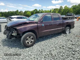 2005 Dodge Dakota SLT z VIN 1D7HE48N85S336539, wystawiony jako Copart lot #56179525 z przebiegiem Nie podano mil oraz Szkoda całkowita • Salvage title. Historia ofert i sprzedaży dostępna na DreamBid. Obrazek 1.