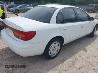 2001 Saturn SL with VIN 1G8ZK527X1Z258932, listed as a IAAI auction lot 42722280 with 95,178 mi miles and . Bid and sale history available at DreamBid. Image 4.