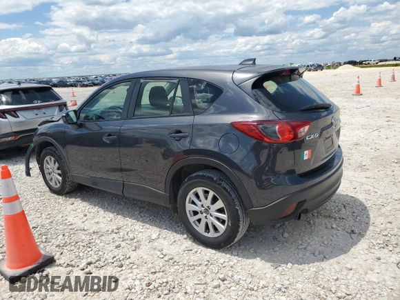 2014 Mazda CX-5 Sport z VIN JM3KE2BE8E0421316, wystawiony jako Copart lot #56548005 z przebiegiem 203 096 mil mil oraz Szkoda całkowita • Salvage title. Historia ofert i sprzedaży dostępna na DreamBid. Obrazek 2.