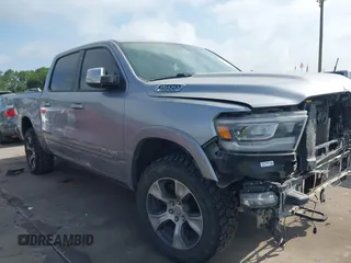 2019 Ram 1500 Laramie with VIN 1C6SRFJT8KN686506, listed as a IAAI auction lot 42499382 with 145,287 mi miles and . Bid and sale history available at DreamBid. Image 1.