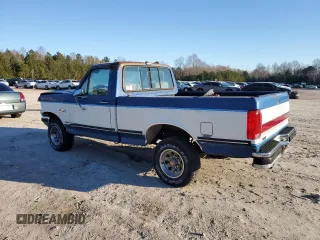 1990 Ford F-150 with VIN 1FTEF14N1LNA30373, listed as a Copart auction lot 85961874 with 27,509 mi miles and Salvage Title. Bid and sale history available at carsss.com. Image 2.