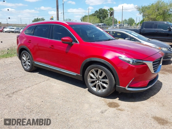 2017 Mazda CX-9 Grand Touring z VIN JM3TCADY3H0140895, wystawiony jako IAAI lot #42817948 z przebiegiem 125 288 mil mil oraz . Historia ofert i sprzedaży dostępna na DreamBid. Obrazek 1.