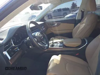 2019 Audi Q8 Prestige z VIN WA1FVBF13KD033878, wystawiony jako IAAI lot #41461807 z przebiegiem 53 697 mil mil oraz . Historia ofert i sprzedaży dostępna na DreamBid. Obrazek 5.