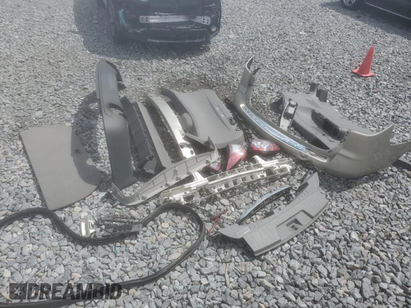 2015 Chevrolet Traverse LTZ z VIN 1GNKRJKD8FJ269524, wystawiony jako Copart lot #56700805 z przebiegiem 110 605 mil mil oraz Szkoda całkowita • Salvage title. Historia ofert i sprzedaży dostępna na DreamBid. Obrazek 13.