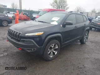 2014 Jeep Cherokee Trailhawk with VIN 1C4PJMBB5EW120432, listed as a IAAI auction lot 41973114 with 88,795 mi miles. Bid and sale history available at carsss.com. Image 17.