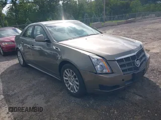 2011 Cadillac CTS Luxury z VIN 1G6DG5EY7B0131764, wystawiony jako IAAI lot #42316845 z przebiegiem 101 888 mil mil oraz . Historia ofert i sprzedaży dostępna na DreamBid. Obrazek 1.