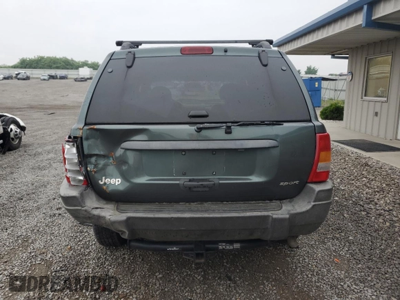 2002 Jeep Grand Cherokee z VIN 1J4GX38S72C152046, wystawiony jako Copart lot #57963095 z przebiegiem 204 576 mil mil oraz Szkoda całkowita • Salvage title. Historia ofert i sprzedaży dostępna na DreamBid. Obrazek 6.