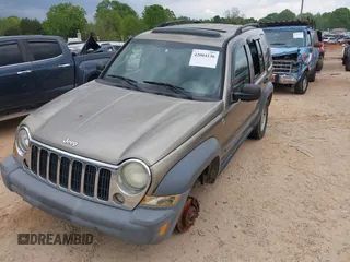 2005 Jeep Liberty Sport with VIN 1J4GL48K65W531365, listed as a IAAI auction lot 42004136 with 160,756 mi miles. Bid and sale history available at carsss.com. Image 2.