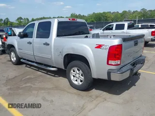 2012 GMC Sierra 1500 SLE with VIN 3GTP2VE71CG257499, listed as a IAAI auction lot 42074272 with 211,038 mi miles and . Bid and sale history available at DreamBid. Image 3.