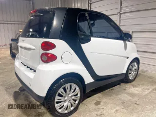 2012 Smart fortwo Pure z VIN WMEEJ3BA5CK540092, wystawiony jako Copart lot #57123825 z przebiegiem 59 356 mil mil oraz Szkody całkowita. Historia ofert i sprzedaży dostępna na DreamBid. Obrazek 4.