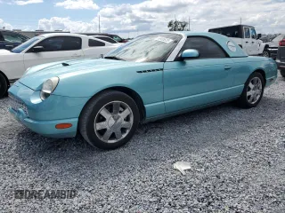 2002 Ford Thunderbird Hardtop Premium z VIN 1FAHP60A72Y104943, wystawiony jako Copart lot #56905825 z przebiegiem 138 244 mil mil oraz Szkoda całkowita • Salvage title. Historia ofert i sprzedaży dostępna na DreamBid. Obrazek 1.