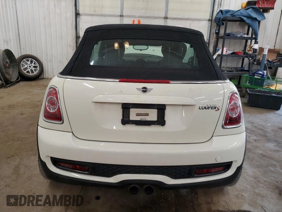 2015 MINI Convertible S с VIN WMWZP3C54F2A90956, выставлен на аукционе Copart как лот 57052545 с пробегом 39 096 миль миль и Списание • Salvage title. История ставок и продаж доступна на DreamBid. Изображение 6.