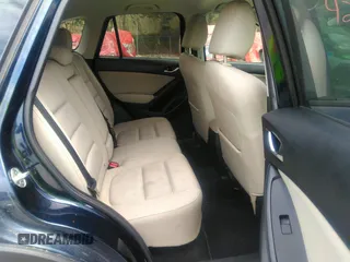 2014 Mazda CX-5 Touring z VIN JM3KE2CYXE0429149, wystawiony jako IAAI lot #42471772 z przebiegiem 222 440 mil mil oraz . Historia ofert i sprzedaży dostępna na DreamBid. Obrazek 8.