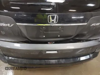 2014 Honda CR-V EX with VIN 2HKRM4H50EH723876, listed as a IAAI auction lot 41464608 with 130,502 mi miles. Bid and sale history available at carsss.com. Image 6.