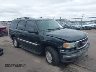 2004 GMC Yukon SLT with VIN 1GKEK13Z24J113954, listed as a IAAI auction lot 41950157 with 174,021 mi miles. Bid and sale history available at carsss.com. Image 1.