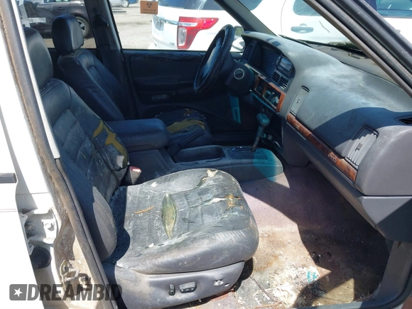 1996 Jeep Grand Cherokee Laredo with VIN 1J4EX58S6TC126610, listed as a IAAI auction lot 41801779 with 1 mi miles. Bid and sale history available at carsss.com. Image 5.