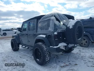 2018 Jeep Wrangler Unlimited Sport S z VIN 1C4HJXDG4JW228078, wystawiony jako IAAI lot #41381520 z przebiegiem 58 899 mil mil oraz . Historia ofert i sprzedaży dostępna na DreamBid. Obrazek 3.