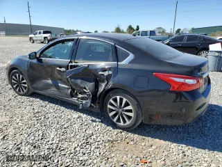 2016 Nissan Altima 2.5 SL with VIN 1N4AL3AP5GC138754, listed as a Copart auction lot 77015834 with 101,394 mi miles and Salvage Title. Bid and sale history available at carsss.com. Image 2.