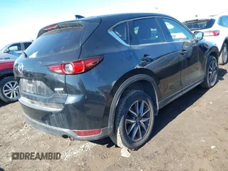 2018 Mazda CX-5 Grand Touring with VIN JM3KFBDM5J0441518, listed as a IAAI auction lot 41748941 with 64,639 mi miles. Bid and sale history available at carsss.com. Image 4.