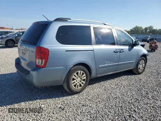 2012 Kia Sedona LX with VIN KNDMG4C70C6447748, listed as a Copart auction lot 71377294 with 146,057 mi miles and Salvage Title. Bid and sale history available at carsss.com. Image 3.