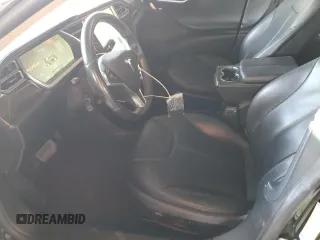 2014 Tesla Model S 60 z VIN 5YJSA1H11EFP36480, wystawiony jako Copart lot #71210254 z przebiegiem 121 014 mil mil oraz Szkoda całkowita • Salvage title. Historia ofert i sprzedaży dostępna na DreamBid. Obrazek 7.