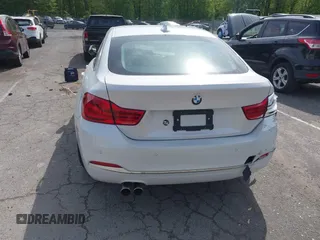 2019 BMW 4 Series 430i xDrive z VIN WBA4J3C55KBL08387, wystawiony jako IAAI lot #42248405 z przebiegiem 115 017 mil mil oraz . Historia ofert i sprzedaży dostępna na DreamBid. Obrazek 16.