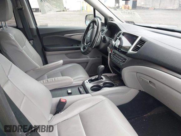 2017 Honda Pilot EX-L with VIN 5FNYF6H50HB101394, listed as a IAAI auction lot 42083318 with 159,359 mi miles and . Bid and sale history available at DreamBid. Image 5.