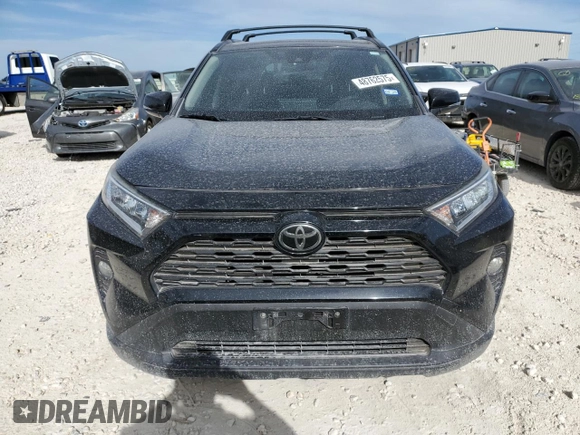 2019 Toyota RAV4 XLE with VIN JTMW1RFV5KD500679, listed as a Copart auction lot 48762575 with 105,403 mi miles and Salvage Title. Bid and sale history available at carsss.com. Image 5.