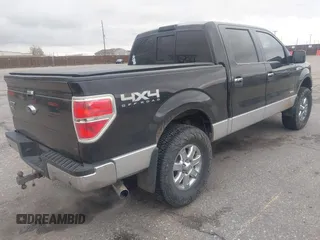 2014 Ford F-150 XL with VIN 1FTFW1ET5EFC27691, listed as a IAAI auction lot 41964611 with 155,816 mi miles and . Bid and sale history available at DreamBid. Image 4.