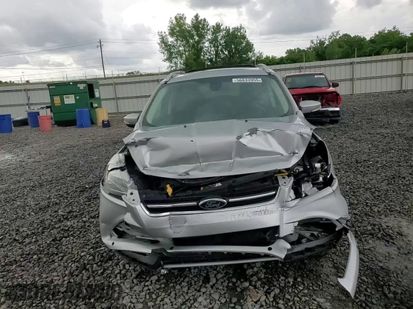 2013 Ford Escape Titanium with VIN 1FMCU9J94DUB00695, listed as a Copart auction lot 56633955 with 129,011 mi miles and Salvage title. Bid and sale history available at DreamBid. Image 14.