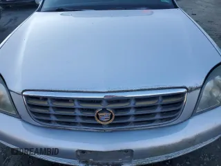 2002 Cadillac DeVille DHS z VIN 1G6KE57Y02U304933, wystawiony jako Copart lot #86919134 z przebiegiem Nie podano mil oraz Czysty tytuł • Clean title. Historia ofert i sprzedaży dostępna na DreamBid. Obrazek 11.
