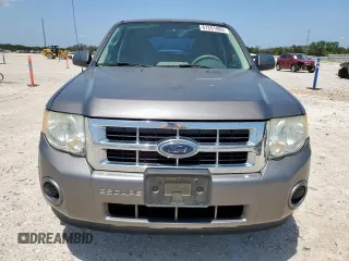 2009 Ford Escape XLS with VIN 1FMCU02739KC12318, listed as a Copart auction lot 61251485 with 179,335 mi miles and Salvage title. Bid and sale history available at DreamBid. Image 5.