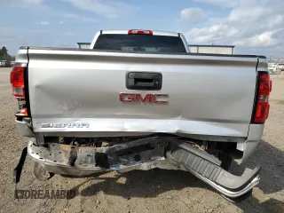2014 GMC Sierra 1500 z VIN 1GTN1TEH2EZ270594, wystawiony jako Copart lot #76334054 z przebiegiem 102 997 mil mil oraz Szkody całkowita. Historia ofert i sprzedaży dostępna na DreamBid. Obrazek 6.