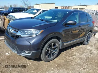 2018 Honda CR-V Touring with VIN 7FARW2H94JE044336, listed as a IAAI auction lot 41934128 with 70,861 mi miles. Bid and sale history available at carsss.com. Image 2.