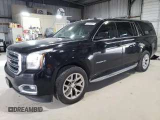 2015 GMC Yukon XL SLE z VIN 1GKS2GKC8FR171025, wystawiony jako Copart lot #52310365 z przebiegiem 146 972 mil mil oraz Szkoda całkowita • Salvage title. Historia ofert i sprzedaży dostępna na DreamBid. Obrazek 1.