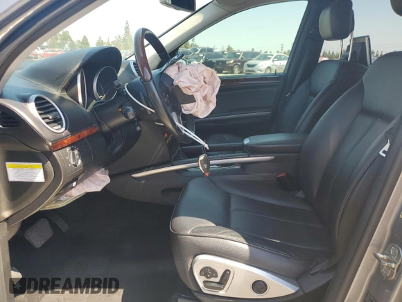 2012 Mercedes-Benz GL 450 z VIN 4JGBF7BE2CA766315, wystawiony jako Copart lot #56687985 z przebiegiem 180 016 mil mil oraz Szkoda całkowita • Salvage title. Historia ofert i sprzedaży dostępna na DreamBid. Obrazek 7.