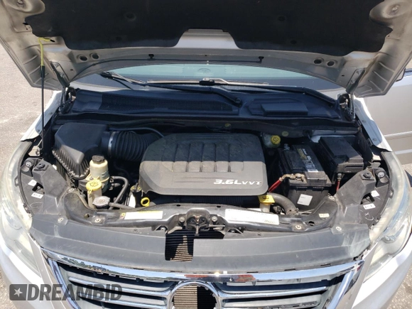 2011 Volkswagen Routan SE with VIN 2V4RW3DG2BR766535, listed as a Copart auction lot 62953345 with 172,620 mi miles and Salvage title. Bid and sale history available at DreamBid. Image 12.